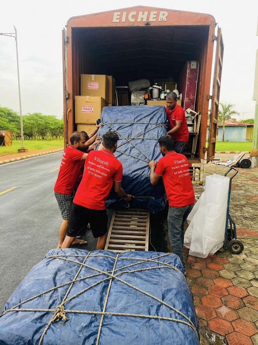 Team loading and securing goods onto the truck